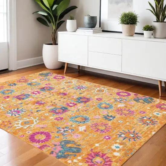 Blue And Orange Floral Distressed Area Rug Photo 4