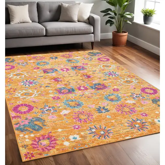 Blue And Orange Floral Distressed Area Rug Photo 1