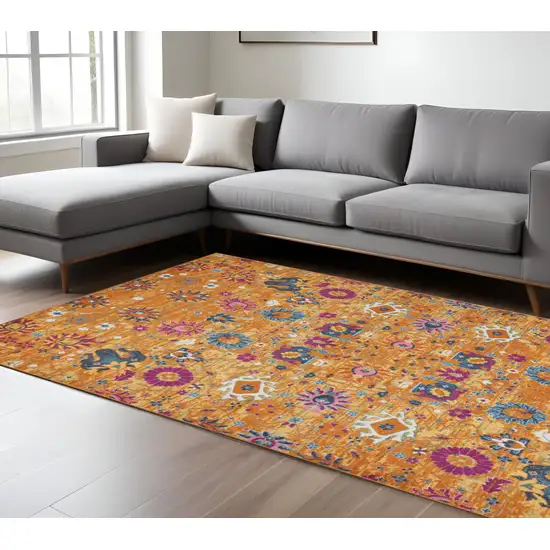 Blue And Orange Floral Distressed Area Rug Photo 2