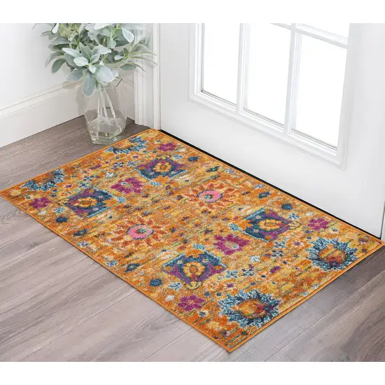 Blue And Orange Floral Distressed Area Rug Photo 2
