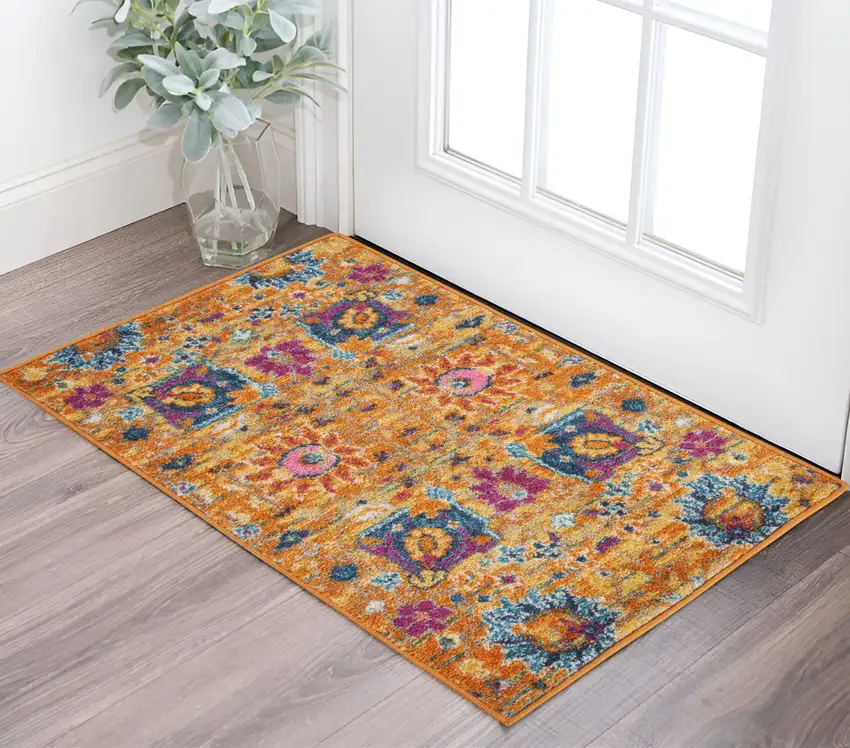 Blue And Orange Floral Distressed Area Rug Photo 2