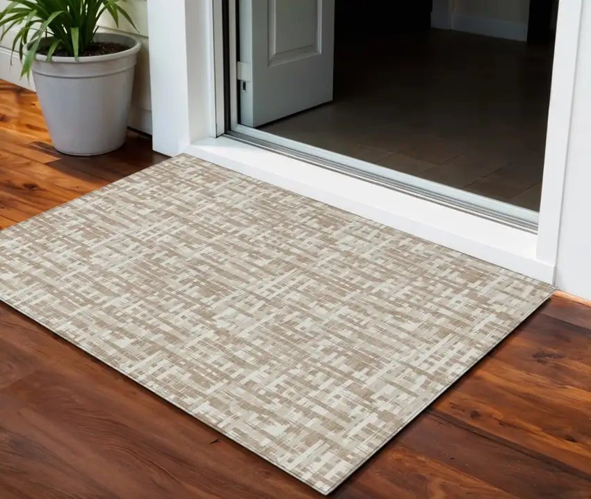 Tan And Beige Abstract Washable Indoor Outdoor Area Rug Photo 1