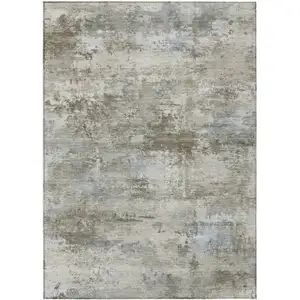 Photo of Tan And Beige Abstract Washable Indoor Outdoor Area Rug