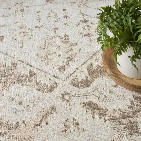 Tan And Beige Floral Distressed Area Rug Photo 8