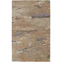 Photo of Tan And Blue Wool Abstract Tufted Handmade Stain Resistant Area Rug
