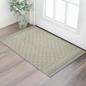 Photo of Tan And Brown Diamond Area Rug