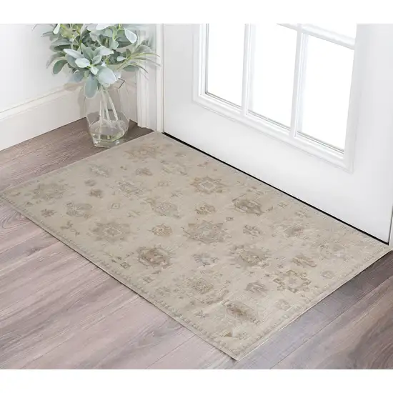 Tan And Brown Floral Hand Knotted Stain Resistant Area Rug Photo 1