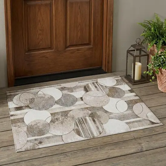 Tan And Brown Geometric Washable Indoor Outdoor Area Rug Photo 1