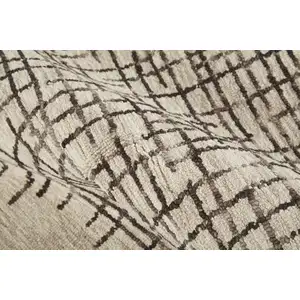 Photo of Tan And Brown Wool Plaid Tufted Handmade Stain Resistant Area Rug