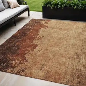 Photo of Tan And Copper Abstract Washable Indoor Outdoor Area Rug