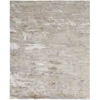 Photo of Tan And Ivory Abstract Power Loom Distressed Area Rug
