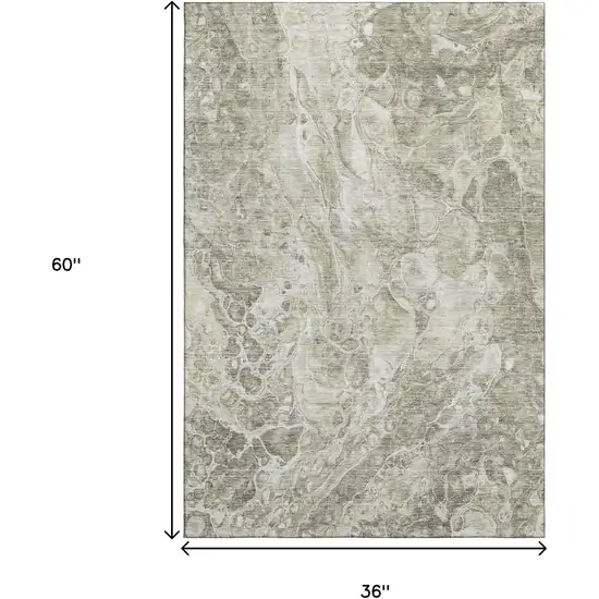 Tan And Ivory Abstract Washable Area Rug With UV Protection Photo 3