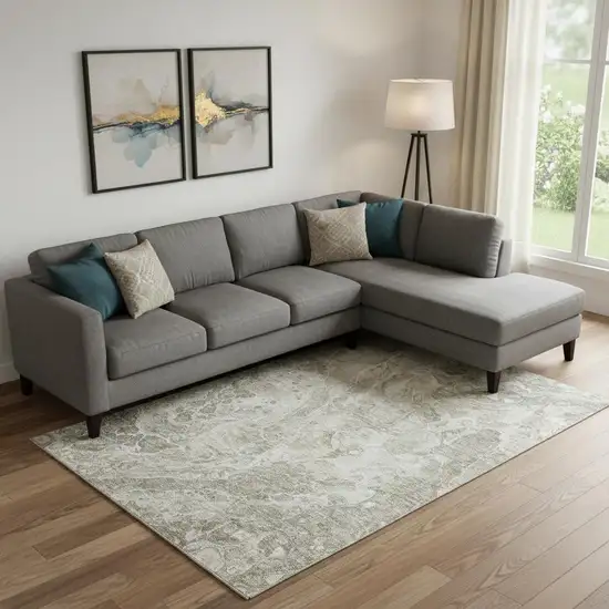 Tan And Ivory Abstract Washable Area Rug With UV Protection Photo 1