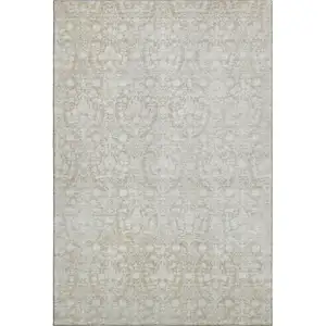 Photo of Tan And Ivory Damask Washable Area Rug With UV Protection