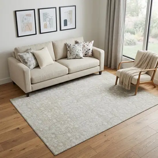 Tan And Ivory Damask Washable Area Rug With UV Protection Photo 1