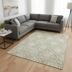 Photo of Tan And Ivory Medallion Washable Area Rug With UV Protection