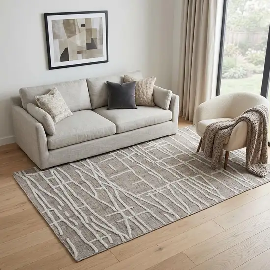 Tan And Ivory Wool Abstract Hand Tufted Area Rug Photo 1