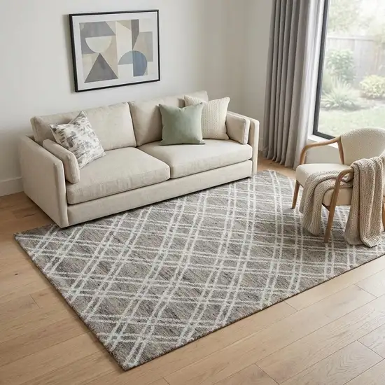 Tan And Ivory Wool Geometric Hand Tufted Area Rug Photo 1