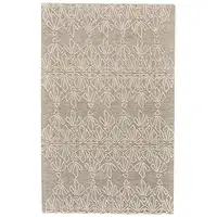 Photo of Tan And Ivory Wool Geometric Tufted Handmade Stain Resistant Area Rug