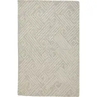 Photo of Tan And Ivory Wool Geometric Tufted Handmade Stain Resistant Area Rug