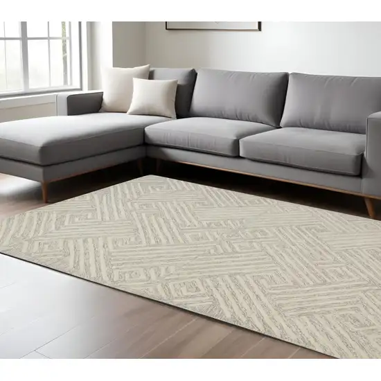 Tan And Ivory Wool Geometric Tufted Handmade Stain Resistant Area Rug Photo 1