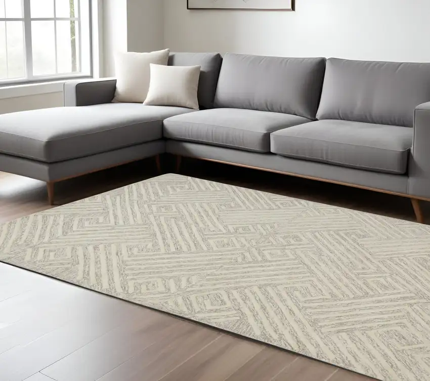 Tan And Ivory Wool Geometric Tufted Handmade Stain Resistant Area Rug Photo 1