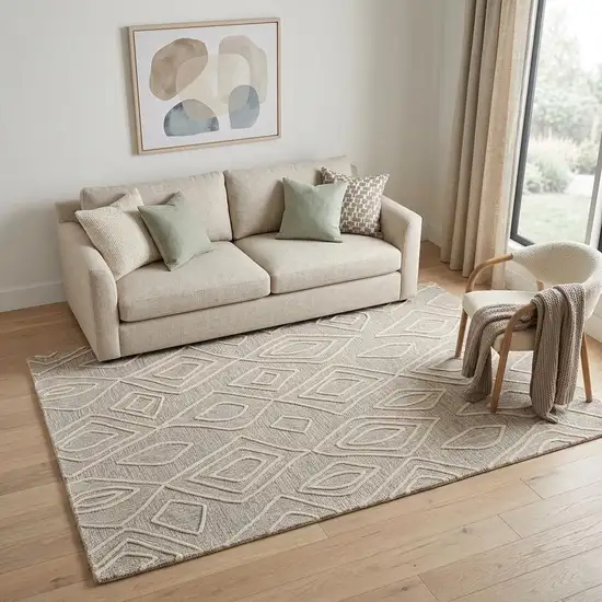 Tan And Ivory Wool Geometric Tufted Handmade Stain Resistant Area Rug Photo 1