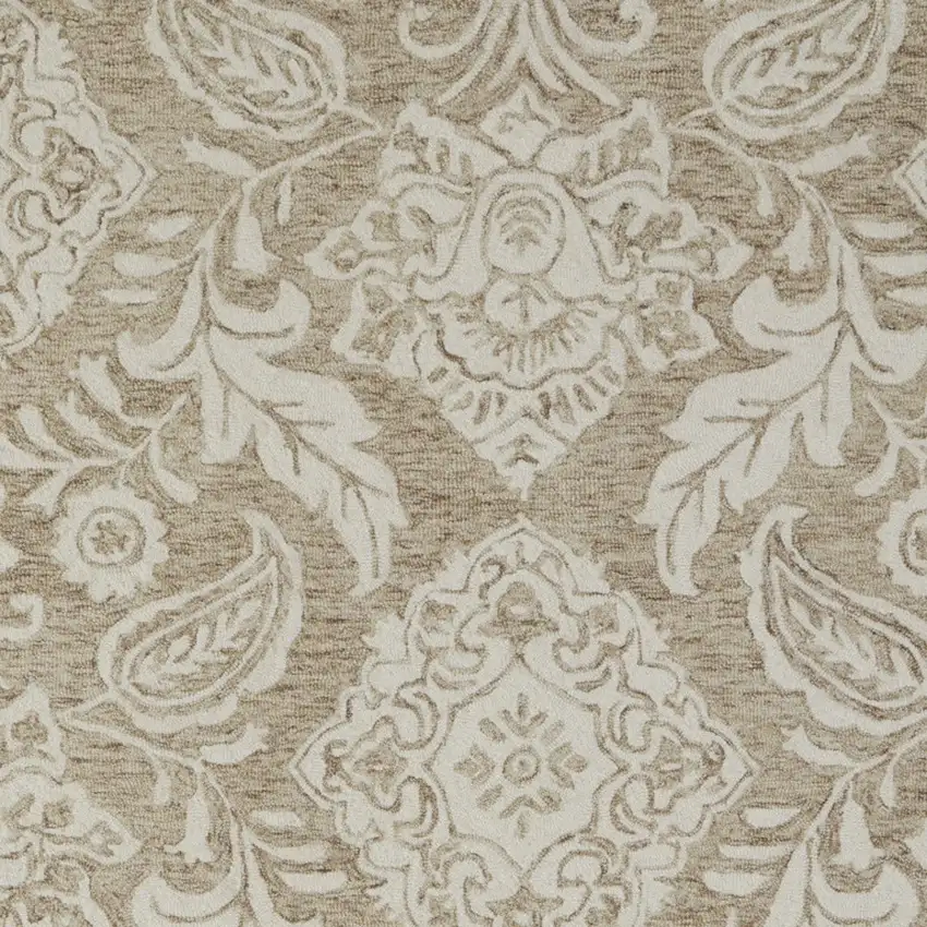 Tan And Ivory Wool Paisley Tufted Handmade Stain Resistant Area Rug Photo 4
