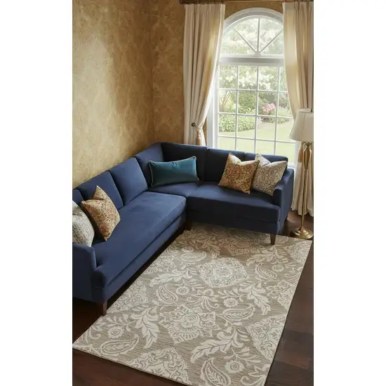 Tan And Ivory Wool Paisley Tufted Handmade Stain Resistant Area Rug Photo 1