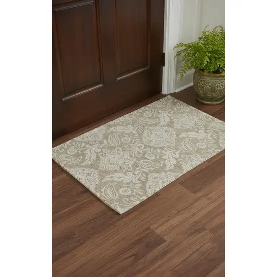 Tan And Ivory Wool Paisley Tufted Handmade Stain Resistant Area Rug Photo 1