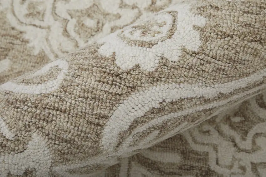 Tan And Ivory Wool Paisley Tufted Handmade Stain Resistant Area Rug Photo 9