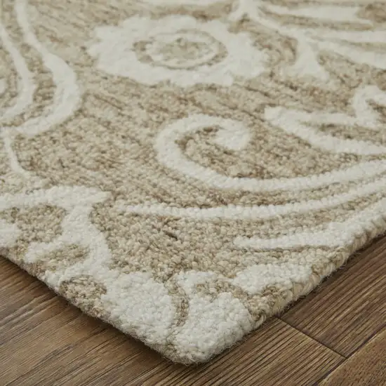 Tan And Ivory Wool Paisley Tufted Handmade Stain Resistant Area Rug Photo 9