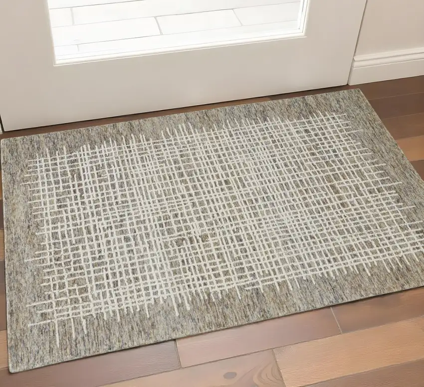Tan And Ivory Wool Crosshatch Hand Tufted Area Rug Photo 1