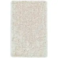 Photo of Tan And Taupe Shag Tufted Handmade Stain Resistant Area Rug