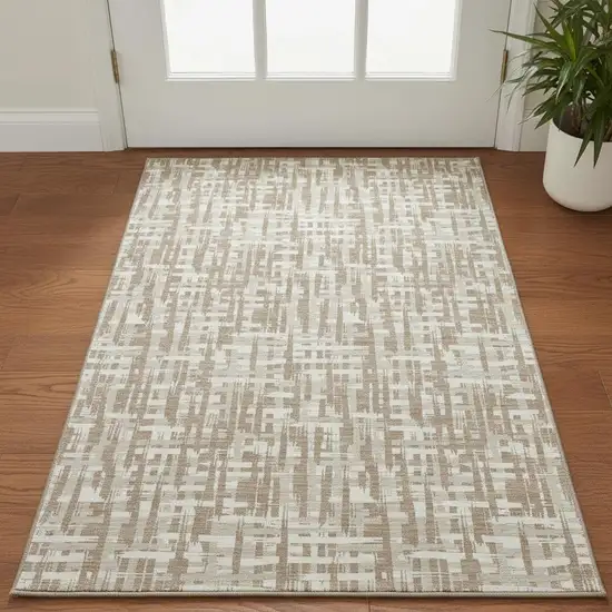 Tan Beige And Ivory Abstract Geometric Washable Area Rug With UV Protection Photo 2