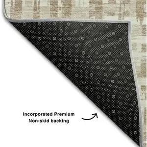 Photo of Tan Beige And Ivory Abstract Geometric Washable Area Rug With UV Protection