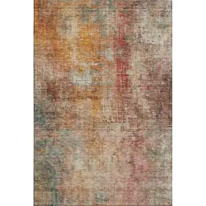 Photo of Tan Beige And Red Abstract Washable Area Rug With UV Protection