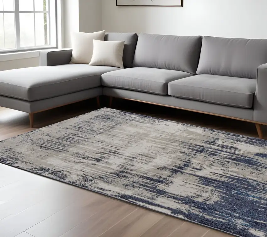 Tan Blue And Ivory Abstract Power Loom Distressed Area Rug Photo 2