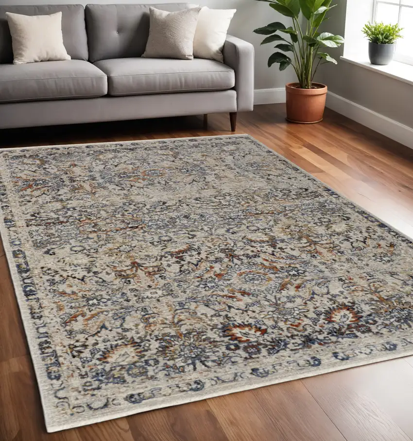 Tan and Blue Floral Power Loom Distressed Non Skid Area Rug With Fringe Photo 2