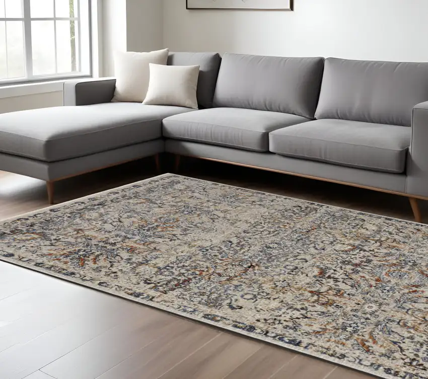 Tan and Blue Floral Power Loom Distressed Non Skid Area Rug With Fringe Photo 1