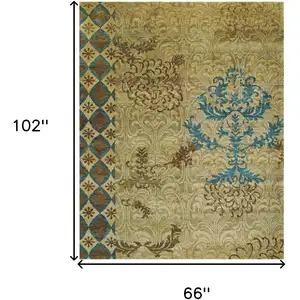 Photo of Tan Blue and Brown Floral Hand Knotted Area Rug