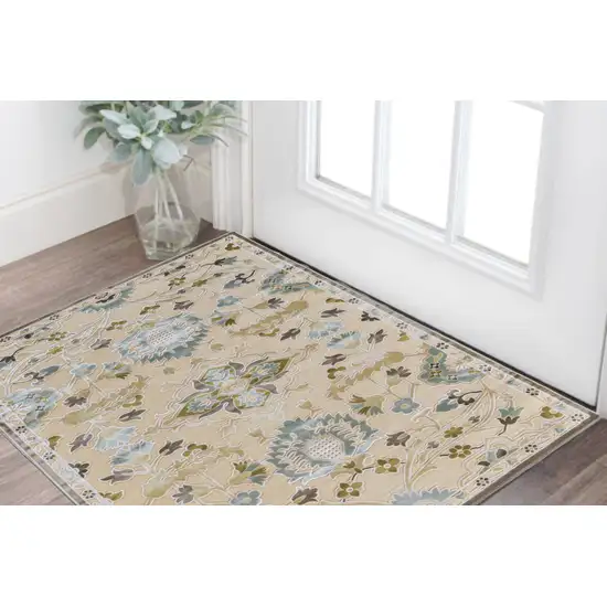 Tan Blue and Brown Floral Power Loom Worn Faded Area Rug Photo 1