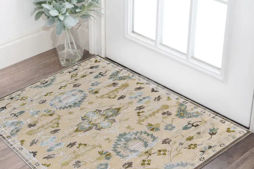 Tan Blue and Brown Floral Power Loom Worn Faded Area Rug Photo 1