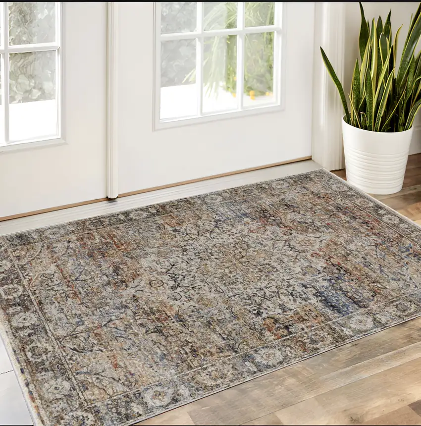 Tan Blue and Brown Oriental Power Loom Area Rug With Fringe Photo 1