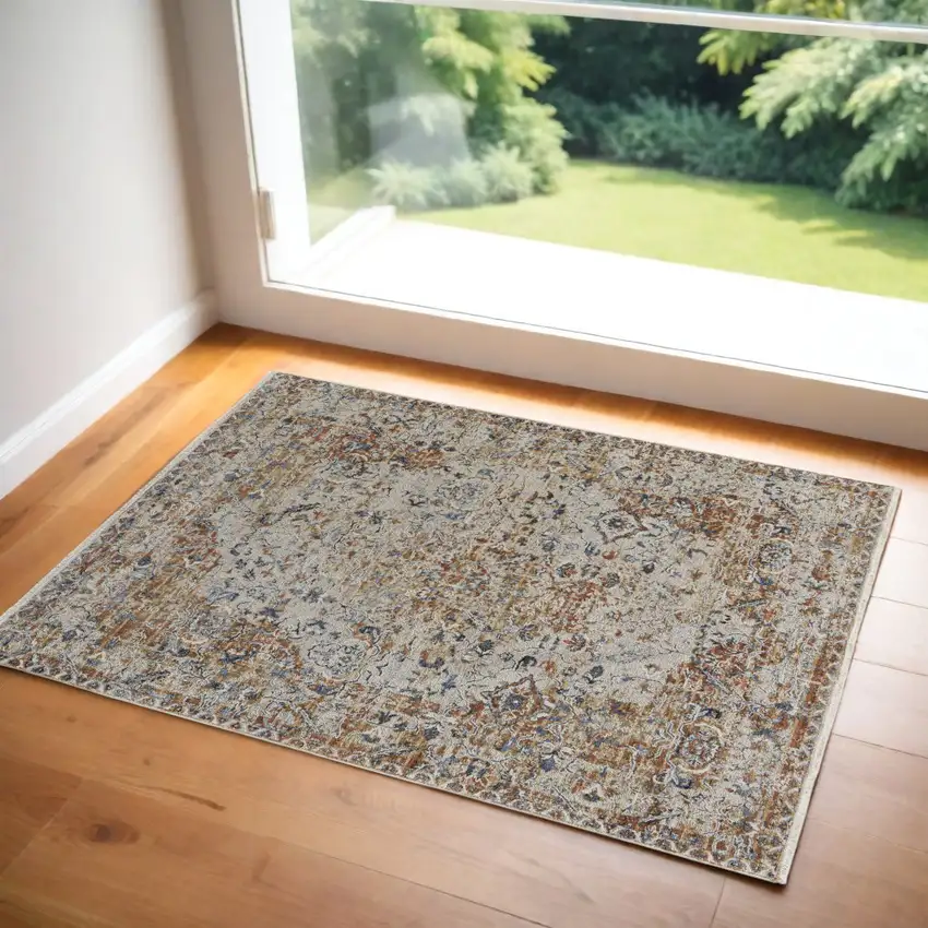 Tan Blue and Brown Oriental Power Loom Worn Faded Area Rug With Fringe Photo 1