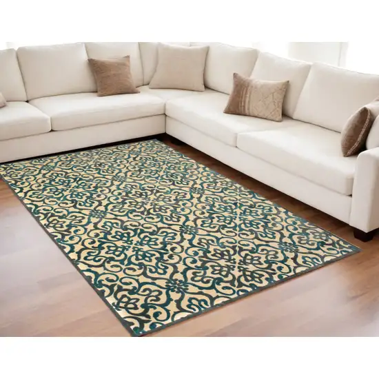 Tan Blue and Taupe Floral Power Loom Area Rug Photo 1