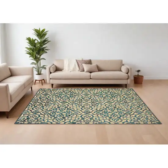 Tan Blue and Taupe Floral Power Loom Area Rug Photo 1
