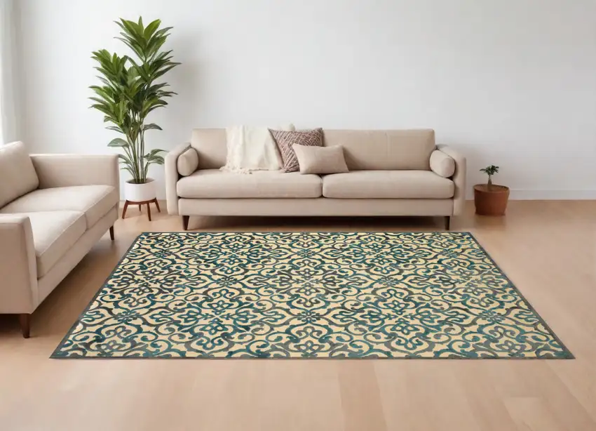 Tan Blue and Taupe Floral Power Loom Area Rug Photo 1