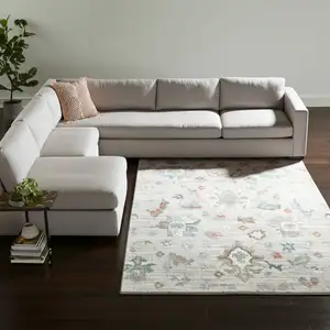 Photo of Tan Brown And Blue Abstract Distressed Area Rug