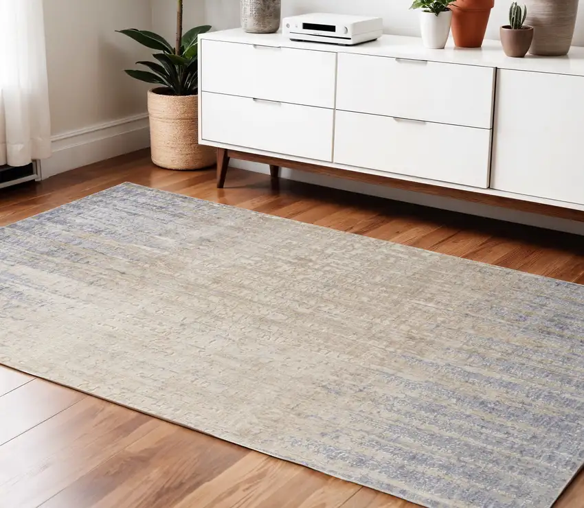 Tan Brown And Blue Abstract Power Loom Distressed Area Rug Photo 1